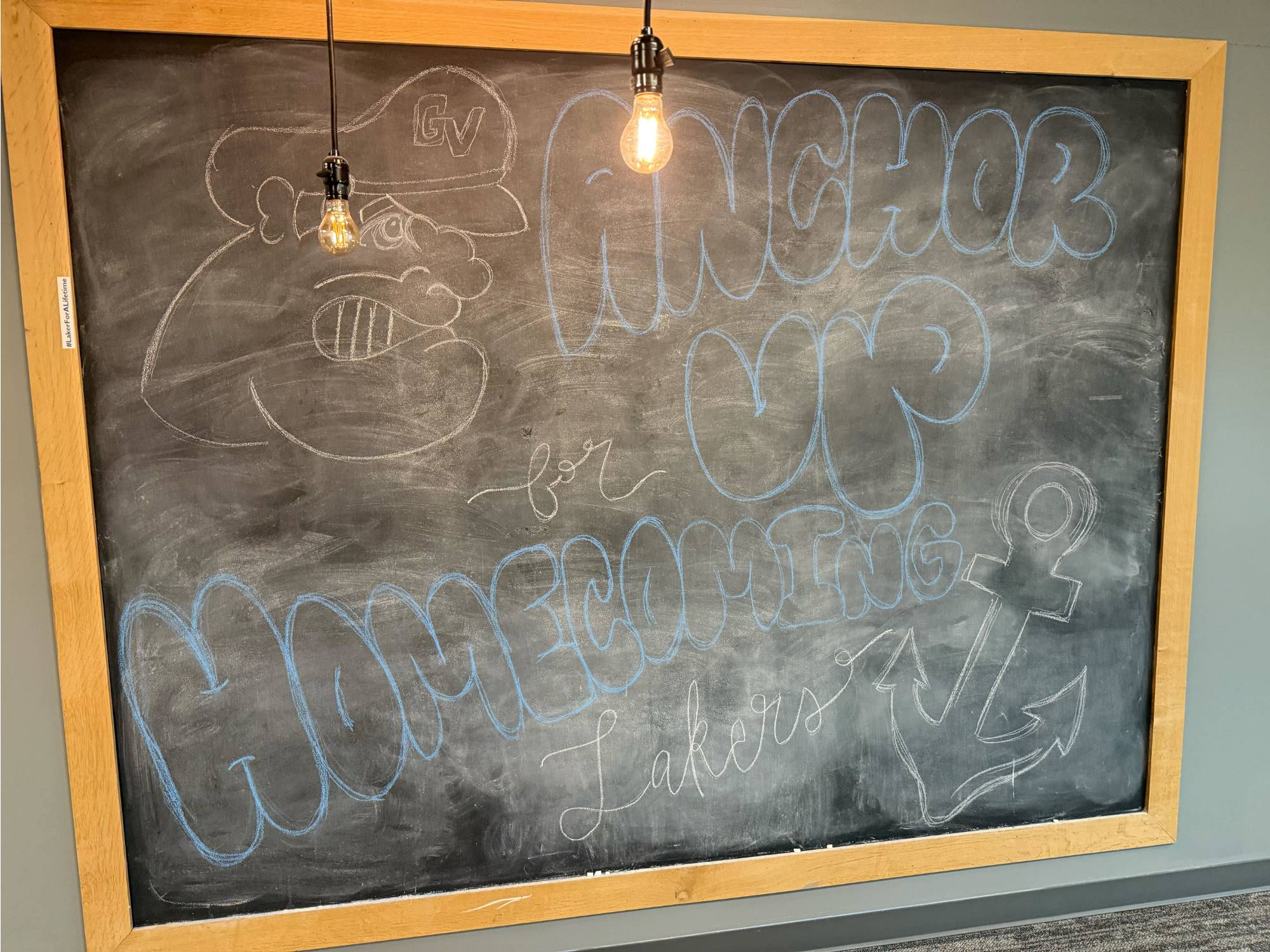 PCE Advising Homecoming decorations, "Anchor Up Homecoming" drawing on chalkboard